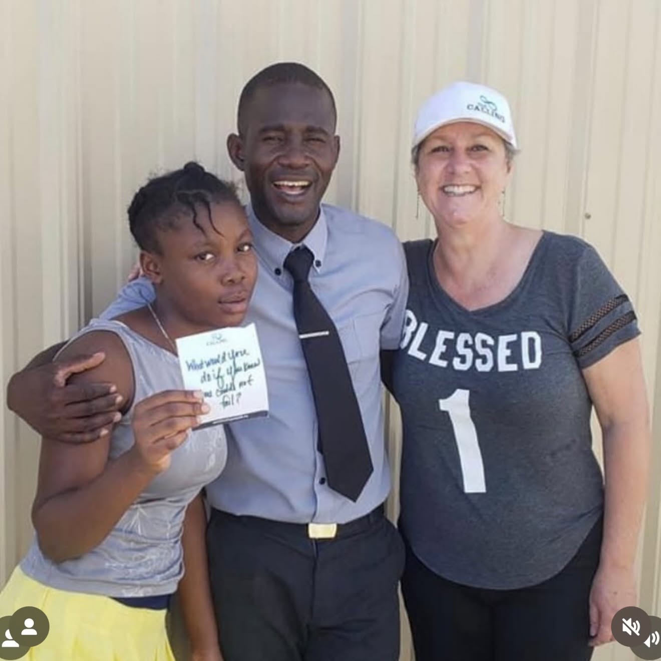 Participants with a Calling dream card at a Haiti entrepreneurial workshop